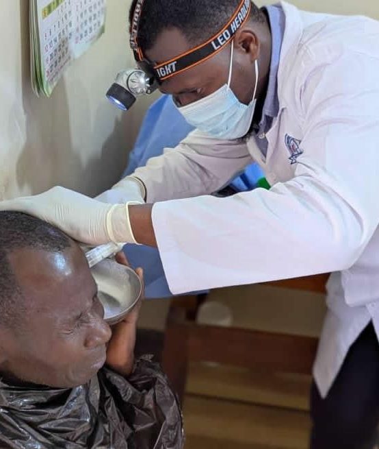 Students of Ear,nose & throat examining patients at Masaka Hospital.