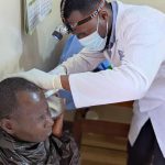 Students of Ear,nose & throat examining patients at Masaka Hospital.