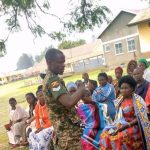 Ear,nose and throat students sensitizing patients at Butega Health center camp.
