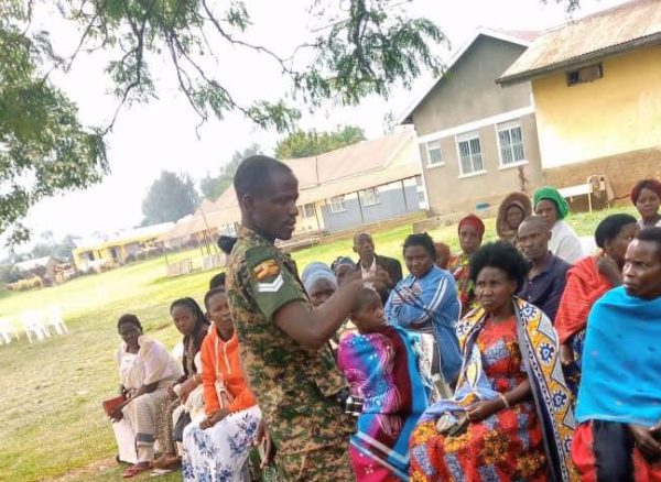 sensitizing patients at Butega Health center camp.